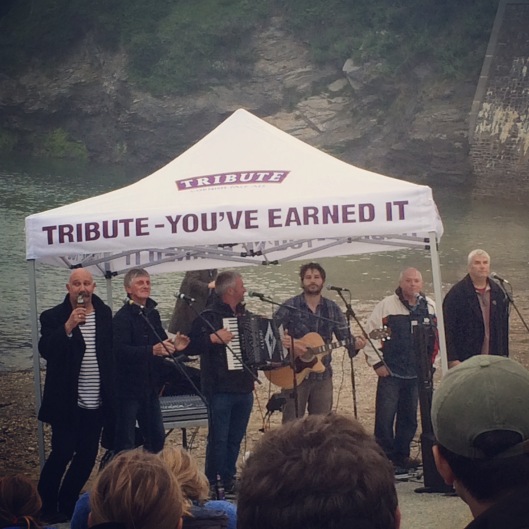 The Fisherman's Friends perform in Port Isaac, Cornwall, June 2015